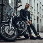 fashionable biker dressed black leather