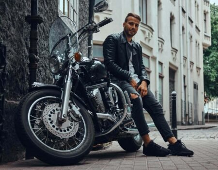 fashionable biker dressed black leather