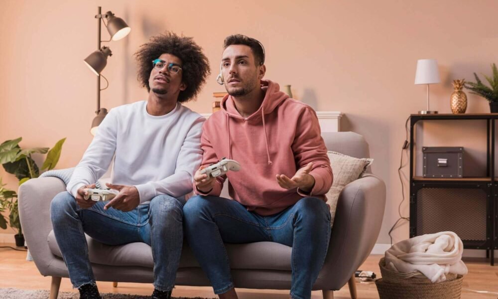 male friends playing with joystick 23 2148405655