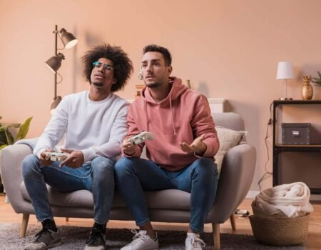 male friends playing with joystick 23 2148405655